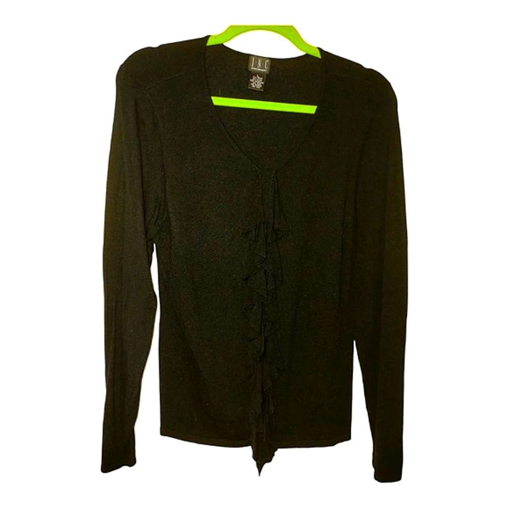 Cute pull on black sweater with ruffled front